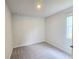 Cozy bedroom with neutral carpet and paint, ready for personalization at 670 Redhead Way (Lot 23), Grayson, GA 30017