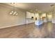 Gourmet kitchen with an island, stainless appliances, and ample counter space for entertaining at 520 Pearl St, Cumming, GA 30040