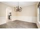 Open dining area that flows into the kitchen with modern appliances at 602 Jules Crest Ct, Lawrenceville, GA 30045