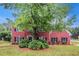 Charming red brick home with lush front yard and mature shade tree at 602 Jules Crest Ct, Lawrenceville, GA 30045