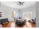 Bedroom featuring hardwood floors, neutral walls, and bright natural light at 1087 Longley Nw Ave, Atlanta, GA 30318