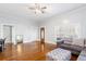Spacious living room featuring hardwood floors, neutral walls, and bright natural light at 1087 Longley Nw Ave, Atlanta, GA 30318