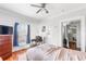 Bright bedroom with hardwood floors and a glimpse into the bathroom at 1091 Longley Nw Ave, Atlanta, GA 30318