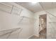 Large walk-in closet offers plenty of storage with wire shelves, providing organization and convenience at 1875 Bernice Dr, Cumming, GA 30041