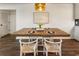 Dining area has seating for four and is adjacent to the kitchen with stainless steel appliances at 1875 Bernice Dr, Cumming, GA 30041
