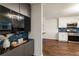 Kitchen view with black cabinets and stainless steel oven and microwave at 1875 Bernice Dr, Cumming, GA 30041