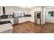 Beautiful kitchen with stainless steel appliances, white cabinets, and dark backsplash at 1875 Bernice Dr, Cumming, GA 30041