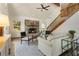 Bright living room with stone fireplace, high ceilings, and natural light at 1875 Bernice Dr, Cumming, GA 30041