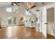 Open concept living room with hardwood floors and lots of natural light at 1875 Bernice Dr, Cumming, GA 30041