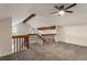 View of a bright loft area featuring high ceilings and exposed beams with carpet at 1875 Bernice Dr, Cumming, GA 30041