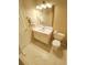 Cozy bathroom featuring a vanity, toilet, and tile flooring at 3060 Baymount Dr, Lawrenceville, GA 30043