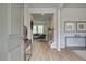 Inviting entryway with wood-look flooring, console table, and glimpses into the living spaces at 1109 Georgian Point Dr, Lawrenceville, GA 30045