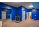 Spacious carpeted basement with access to the staircase and a bathroom, offering versatile living space at 1185 Gallatin Way, Suwanee, GA 30024