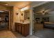 This bathroom features a single sink and access to a bedroom and closet at 1185 Gallatin Way, Suwanee, GA 30024