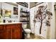 Bathroom featuring a vanity, toilet, mirror, and shower with a tree shower curtain at 1185 Gallatin Way, Suwanee, GA 30024