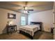 Bedroom with a bed, ceiling fan, window, and desk at 1185 Gallatin Way, Suwanee, GA 30024