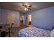 Bedroom featuring a double bed, desk, and chair at 1185 Gallatin Way, Suwanee, GA 30024