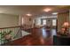 Upstairs loft overlooking the first floor with room for a bedroom and dining table at 1185 Gallatin Way, Suwanee, GA 30024