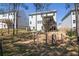 Spacious backyard featuring a mix of trees and lawn, offering privacy and natural beauty at 211 Aspen Valley Ln, Dallas, GA 30157