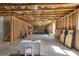 Unfinished basement with exposed beams, ready to be customized with lots of space and natural light at 211 Aspen Valley Ln, Dallas, GA 30157