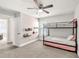 Bedroom with bunk beds, open door, and shelves for storage at 211 Aspen Valley Ln, Dallas, GA 30157