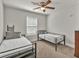 Bedroom featuring 2 beds and neutral decor at 211 Aspen Valley Ln, Dallas, GA 30157