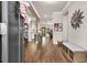 Bright entryway with hardwood floors, neutral walls, and decorative accents at 211 Aspen Valley Ln, Dallas, GA 30157