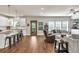 Open-concept living area combining a kitchen, and a seating area at 211 Aspen Valley Ln, Dallas, GA 30157