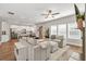Bright, open living room and kitchen with stainless appliances and center island at 211 Aspen Valley Ln, Dallas, GA 30157