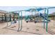 Community playground with swings, slides, and climbing structures for Gathering fun at 211 Aspen Valley Ln, Dallas, GA 30157