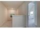 Upstairs hallway has carpeted floors and leads to a bedroom at 376 Collier Mills Rd Dr, Lawrenceville, GA 30045