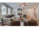 Welcoming living room with fireplace, wood floors, natural light, and comfortable seating at 376 Collier Mills Rd Dr, Lawrenceville, GA 30045
