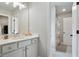 Bathroom with white vanity, granite countertop, and neutral decor at 4383 Capstone Ne Ct, Roswell, GA 30075