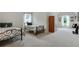 Bedroom with two iron beds, a wooden closet, and plenty of space at 4383 Capstone Ne Ct, Roswell, GA 30075