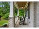 Inviting front porch with rocking chairs and a welcoming ambiance at 4383 Capstone Ne Ct, Roswell, GA 30075