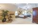 Spacious main bedroom with fireplace, rocking chair and neutral color scheme at 270 Annelise Park Dr, Fayetteville, GA 30214