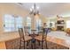 Bright breakfast area offers views of the home's living space and backyard at 270 Annelise Park Dr, Fayetteville, GA 30214