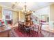 Elegant dining room with a large table and hardwood floors at 270 Annelise Park Dr, Fayetteville, GA 30214