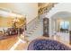 Foyer featuring hardwood floors and a grand staircase at 270 Annelise Park Dr, Fayetteville, GA 30214