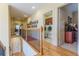 Hallway features hardwood floors and access to the laundry and bedrooms at 270 Annelise Park Dr, Fayetteville, GA 30214
