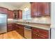 Well-equipped kitchen with granite countertops, stainless steel appliances, and wood cabinets at 270 Annelise Park Dr, Fayetteville, GA 30214