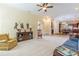 Open-concept living room allows views to the kitchen, breakfast, and entry way at 270 Annelise Park Dr, Fayetteville, GA 30214