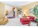 Relaxing living room with neutral tones and views of the foyer at 270 Annelise Park Dr, Fayetteville, GA 30214