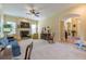 The living room features a fireplace, hardwood floors, and plenty of natural light at 270 Annelise Park Dr, Fayetteville, GA 30214