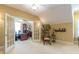 Bright living room showcasing french doors to an office, neutral walls, and cozy seating at 270 Annelise Park Dr, Fayetteville, GA 30214