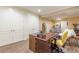 Spacious home office featuring hardwood floors, cabinets, and multiple workstations at 270 Annelise Park Dr, Fayetteville, GA 30214