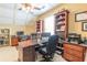 Office space with three desks, coffered ceiling and lots of natural light at 270 Annelise Park Dr, Fayetteville, GA 30214