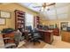 Large office space with two desks, coffered ceiling and lots of natural light at 270 Annelise Park Dr, Fayetteville, GA 30214