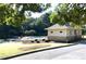 Community pool area with pool house and landscaping, offers a refreshing retreat and an inviting outdoor space at 270 Annelise Park Dr, Fayetteville, GA 30214