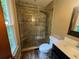 Updated bathroom with a walk-in shower featuring decorative tile and modern fixtures at 2705 Rhoanoke Dr, Duluth, GA 30096